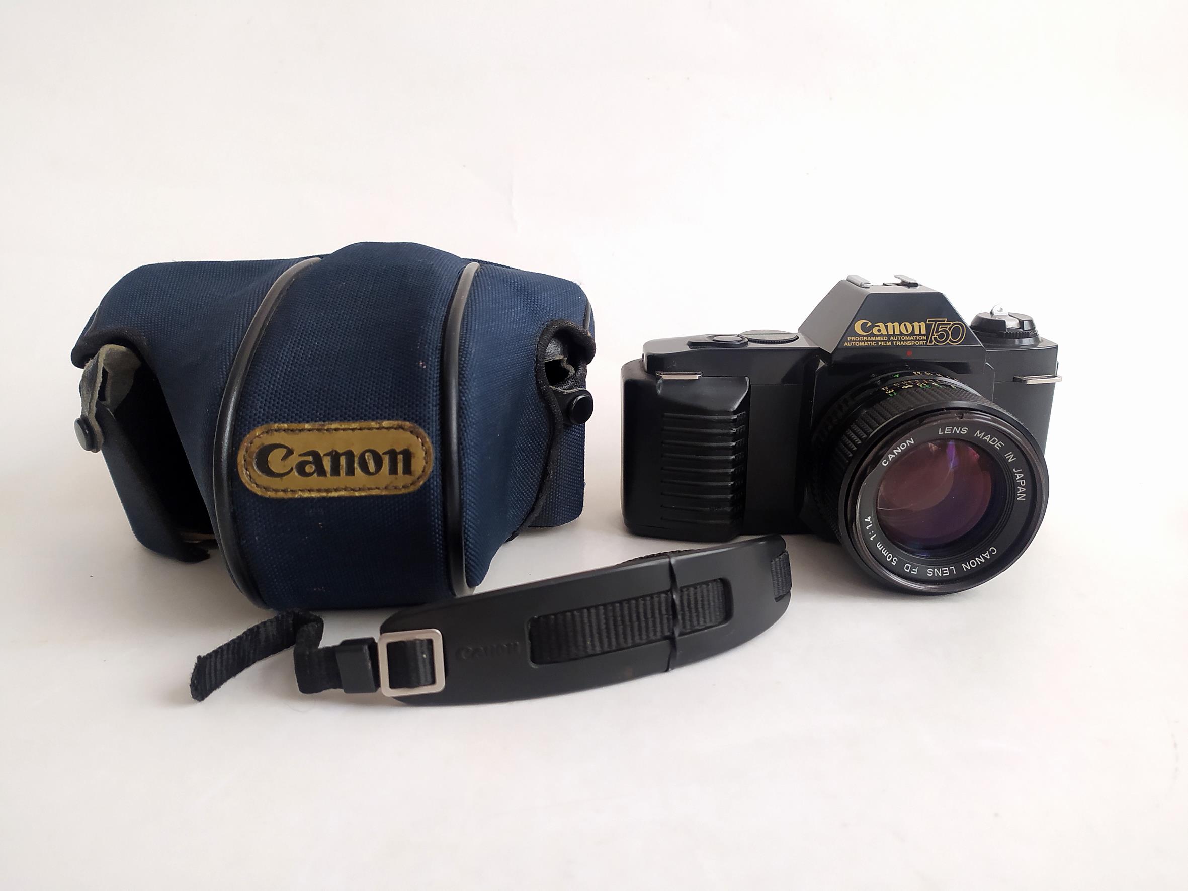  دوربین کانن Canon T50 با لنز 50mm F1.4 