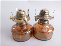 یک جفت چراغ نفتی شامپاینی پررنگ 