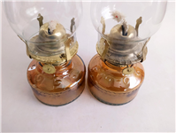 یک جفت چراغ نفتی شامپاینی پررنگ 