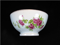 کاسه قدیمی و گل درشت گل سرخی زیبا 