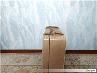 چمدان قدیمی با رنگ بسیار خاص و زیبا 