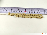 33 عدد مهره طرح دار ساخته شده از استخوان 